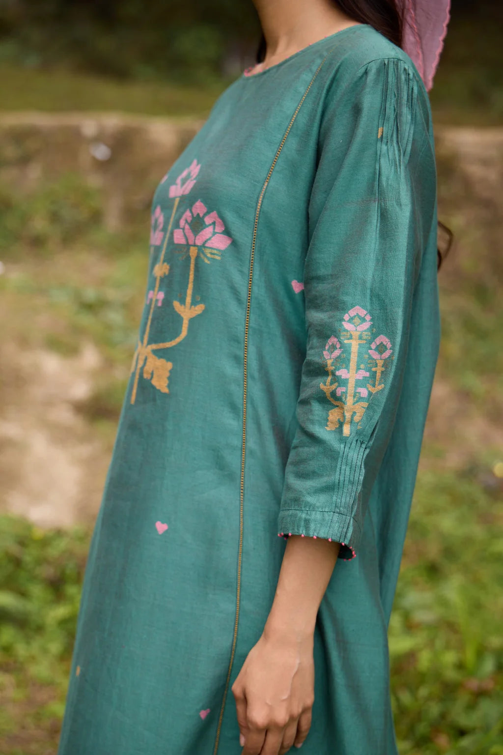 Sarron Anitha Dress, forest green silk-cotton Jamdani panelled dress with floral and heart-shaped motifs.