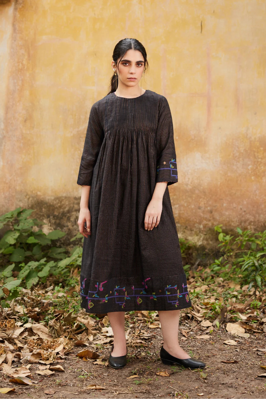 Sarron Anuradha Dress, black and gold zari-striped silk-cotton Jamdani dress with a handwoven tree motif.
