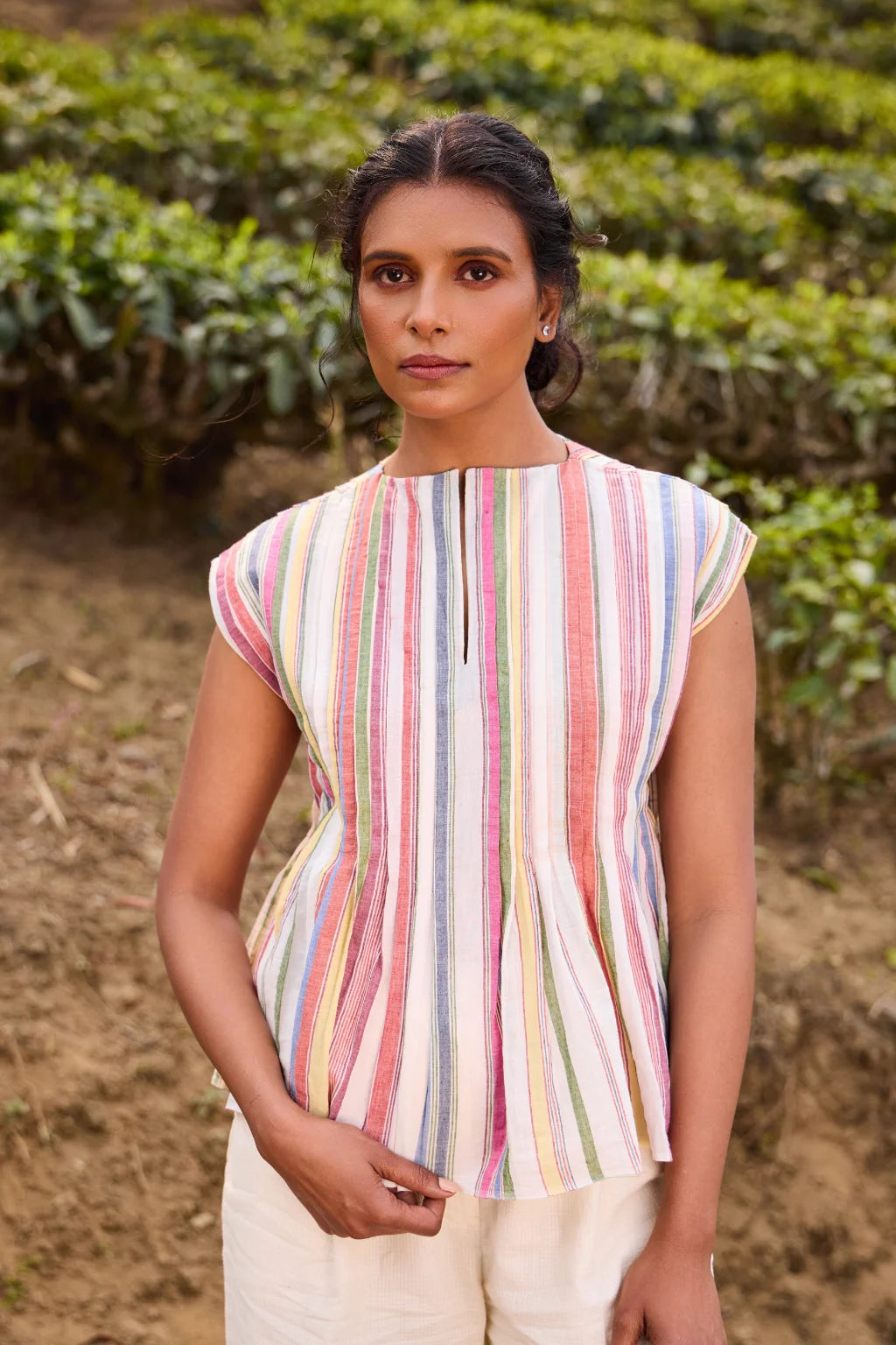 Sarron Banshori Top, short flared top in multicoloured striped handloom cotton with all-over tucks.