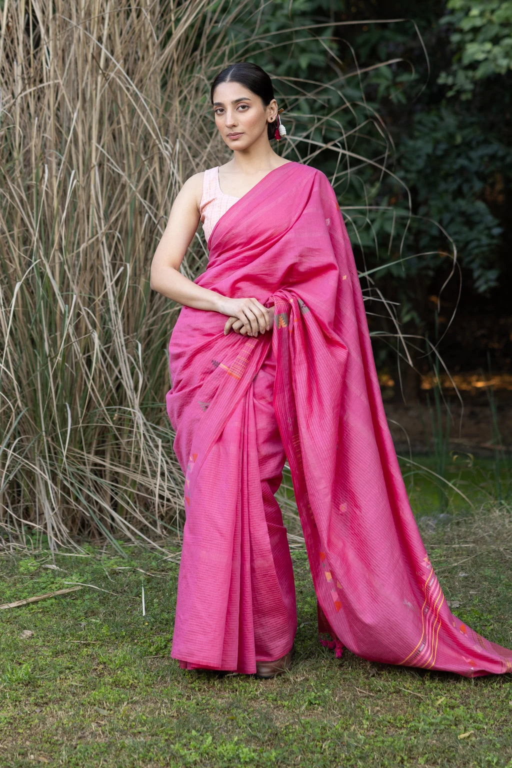 Sarron Gulabi-001 Saree, pink zari-striped silk-cotton Jamdani saree with peacock and tiger motifs.