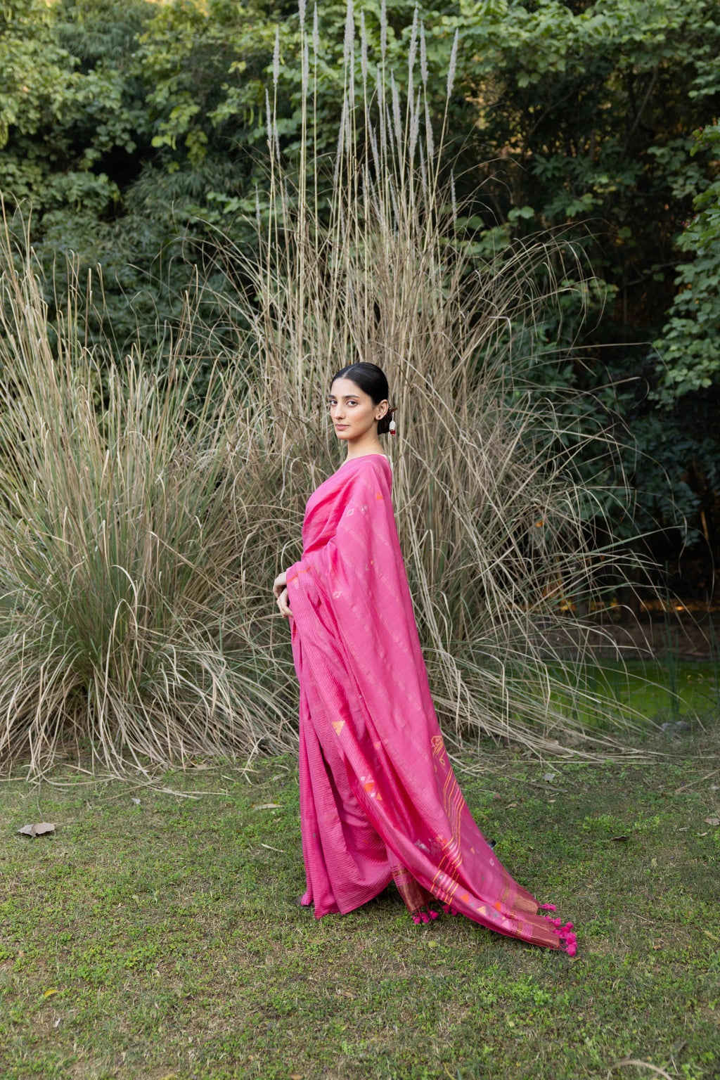 Sarron Gulabi-001 Saree, pink zari-striped silk-cotton Jamdani saree with peacock and tiger motifs.