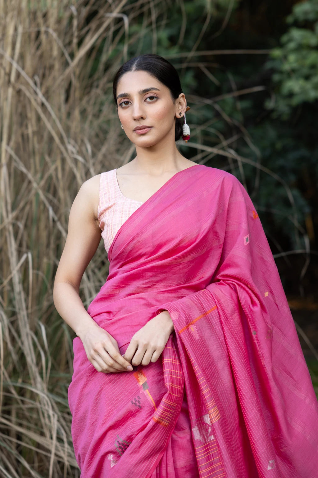 Sarron Gulabi-001 Saree, pink zari-striped silk-cotton Jamdani saree with peacock and tiger motifs.