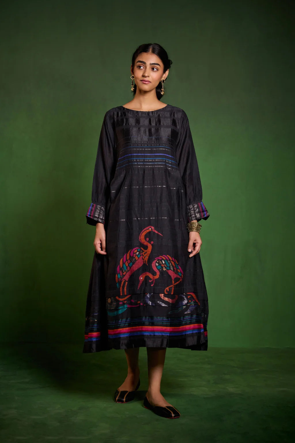 Sarron Hansika Dress, black silk-cotton Jamdani dress with a handwoven crane motif and zari stripes.