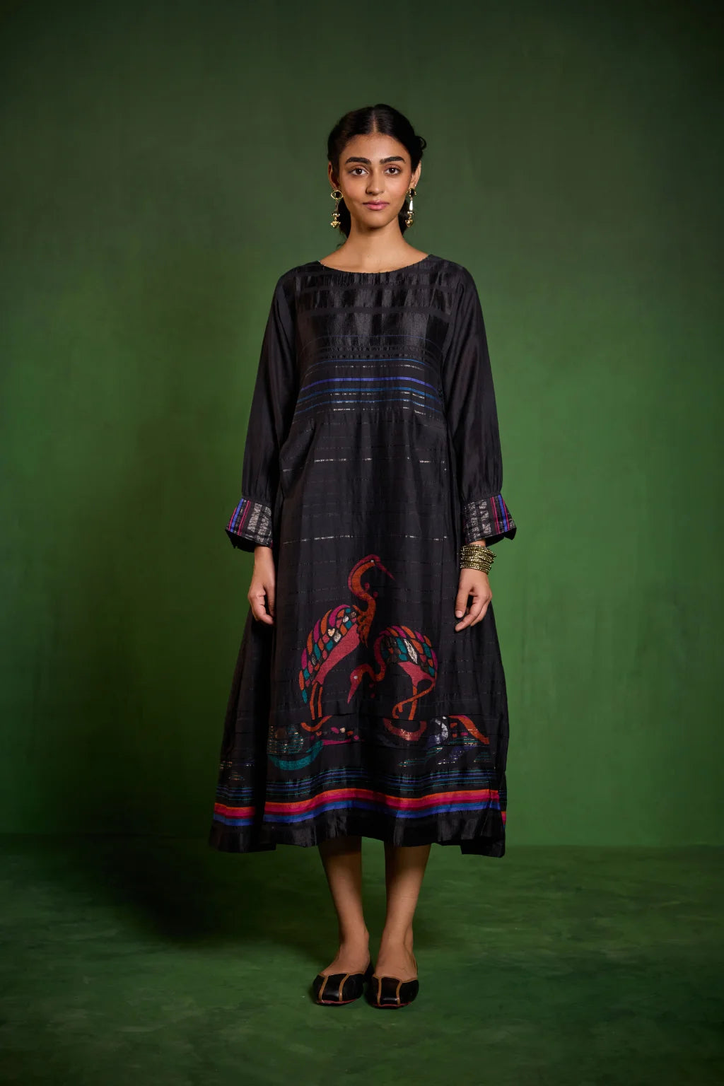 Sarron Hansika Dress, black silk-cotton Jamdani dress with a handwoven crane motif and zari stripes.