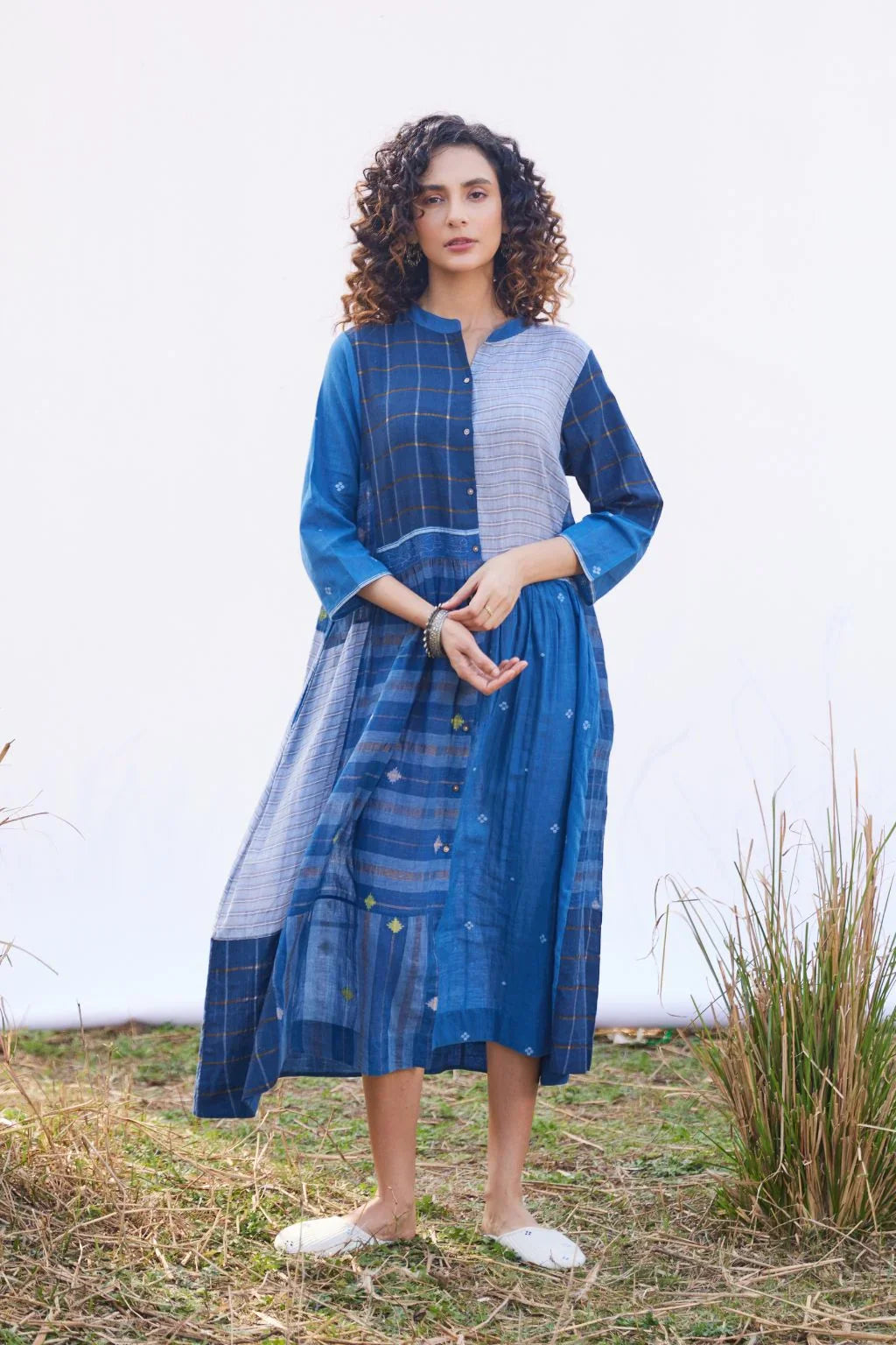 Sarron Indira Dress, blue cotton Jamdani dress with stripes, checks and handwoven Jamdani motifs.
