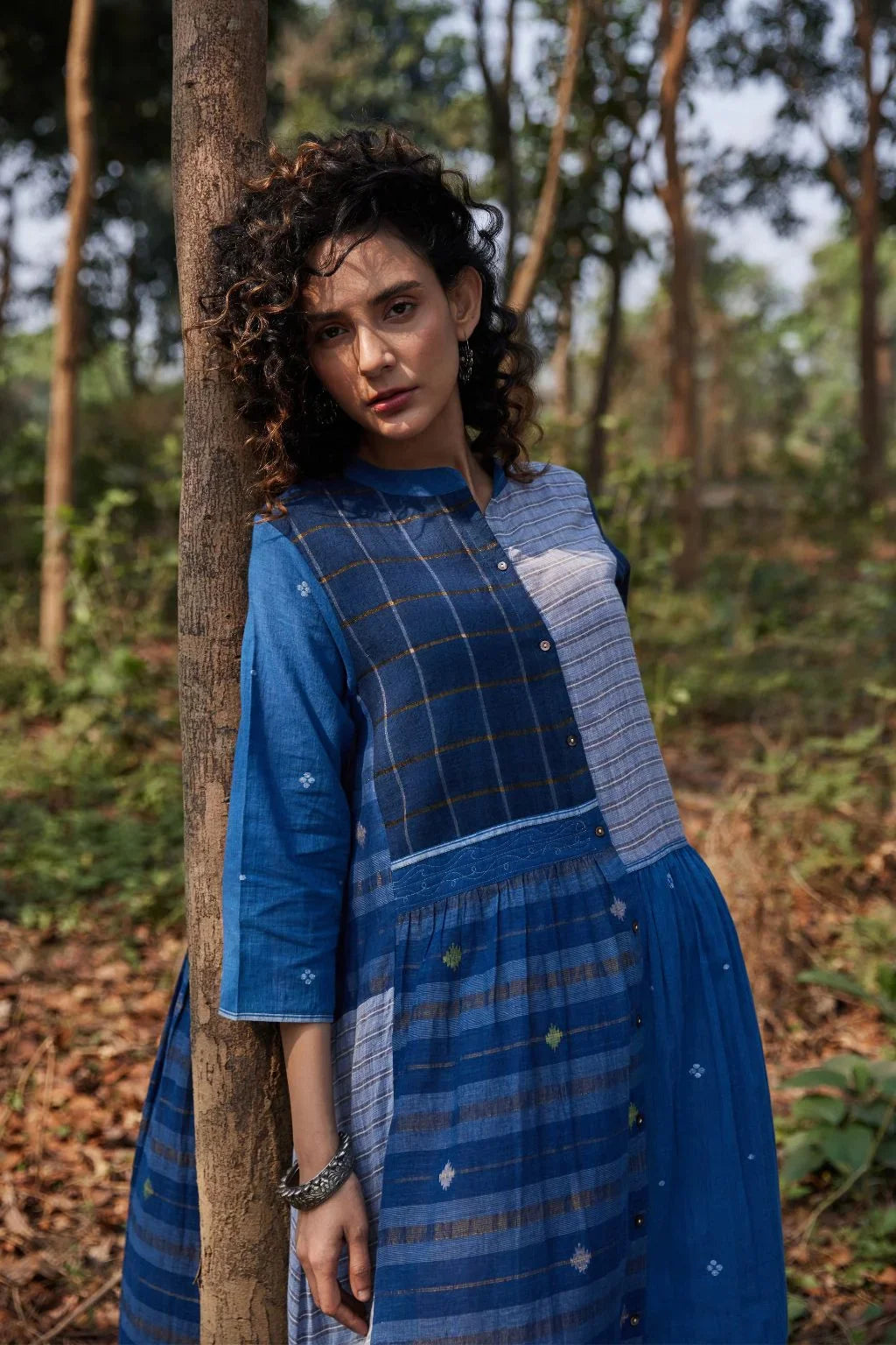 Sarron Indira Dress, blue cotton Jamdani dress with stripes, checks and handwoven Jamdani motifs.