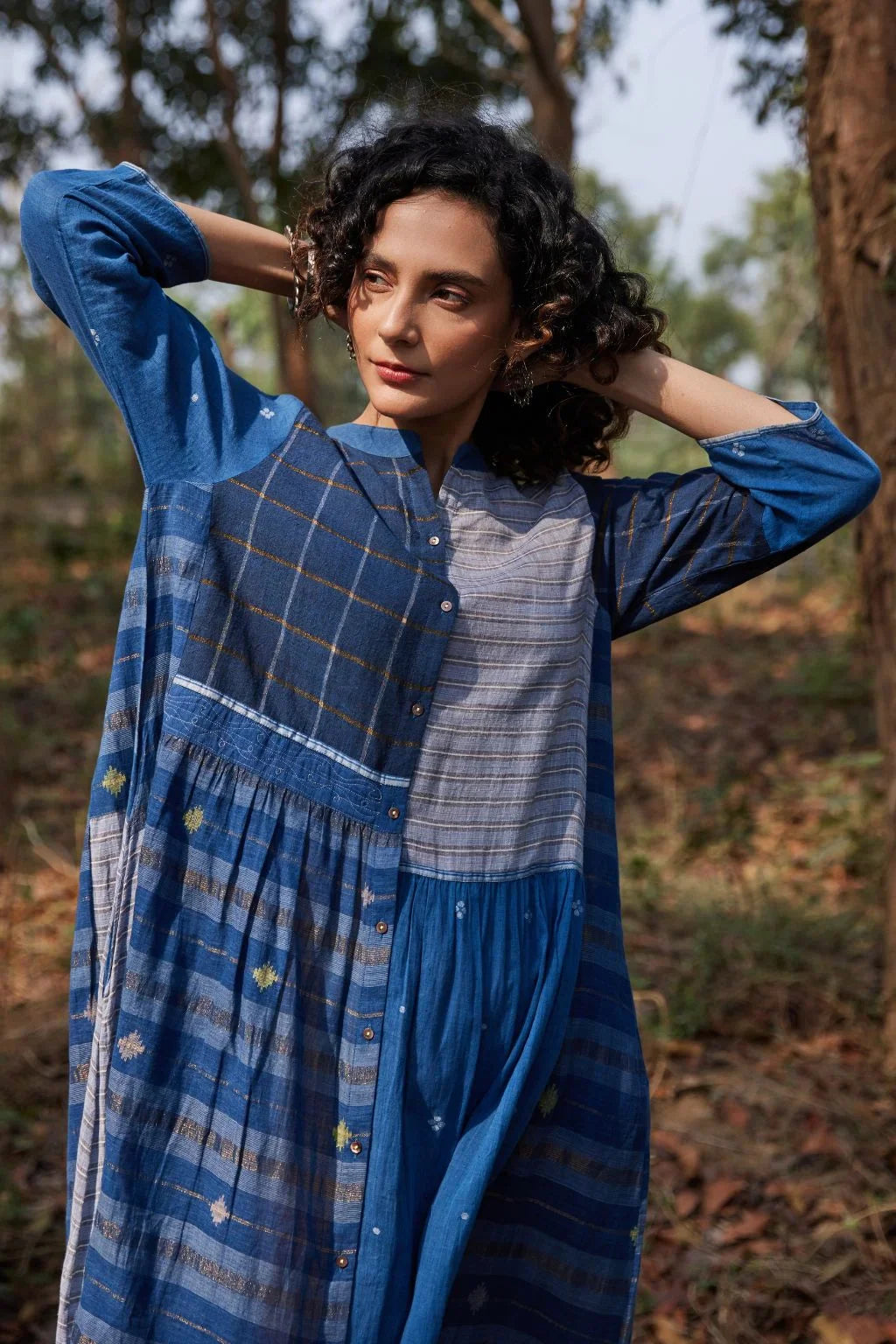 Sarron Indira Dress, blue cotton Jamdani dress with stripes, checks and handwoven Jamdani motifs.