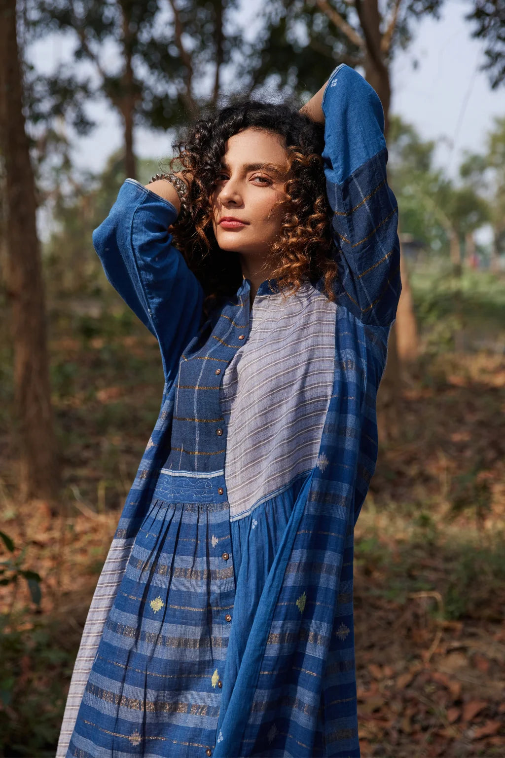 Sarron Indira Dress, blue cotton Jamdani dress with stripes, checks and handwoven Jamdani motifs.