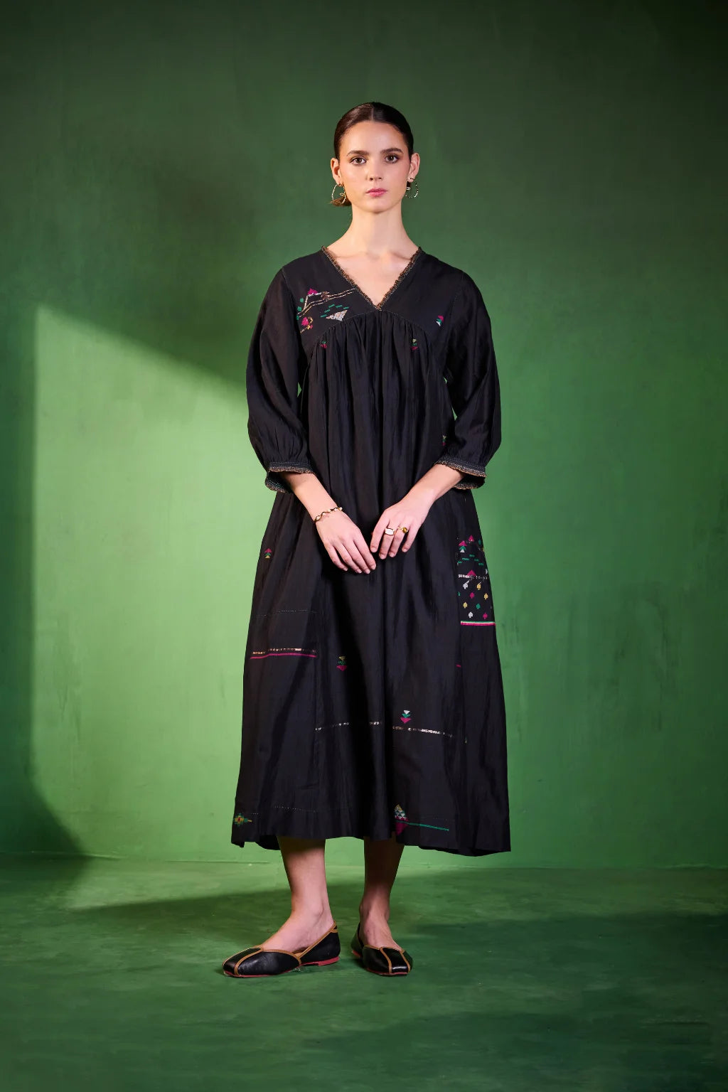 Sarron Kalindi Dress, black silk-cotton Jamdani dress with a V-neck and handwoven geometric motifs.