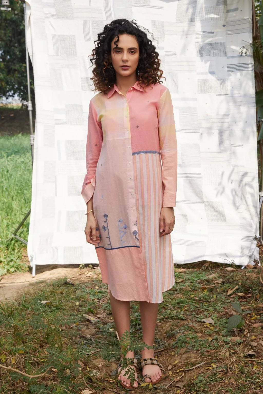 Sarron Kamini Dress, lightweight pink cotton Jamdani dress with a ruffled square neckline and drawstring waist.
