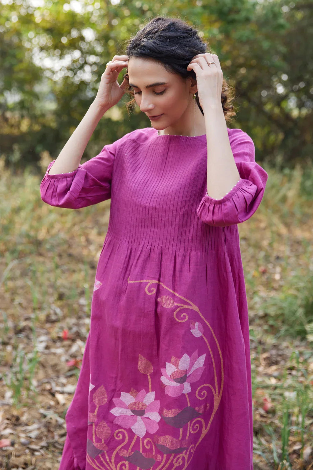 Sarron Keya Dress, fuchsia silk-cotton Jamdani dress with handwoven floral motifs on the skirt.