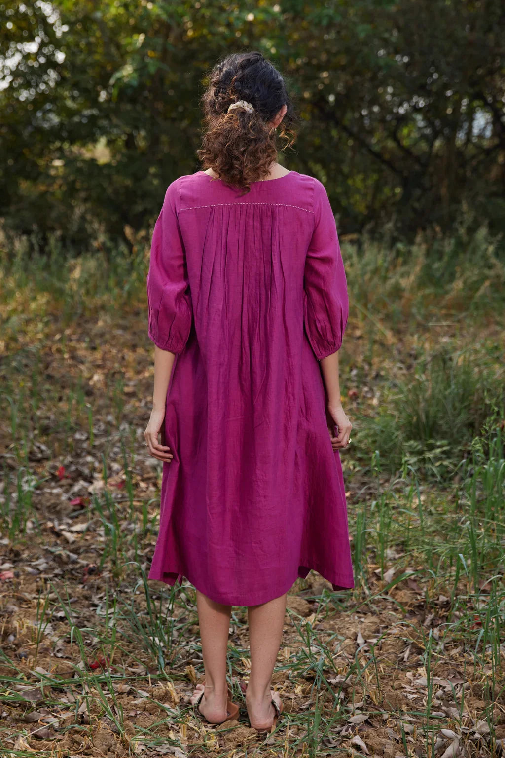 Sarron Keya Dress, fuchsia silk-cotton Jamdani dress with handwoven floral motifs on the skirt.