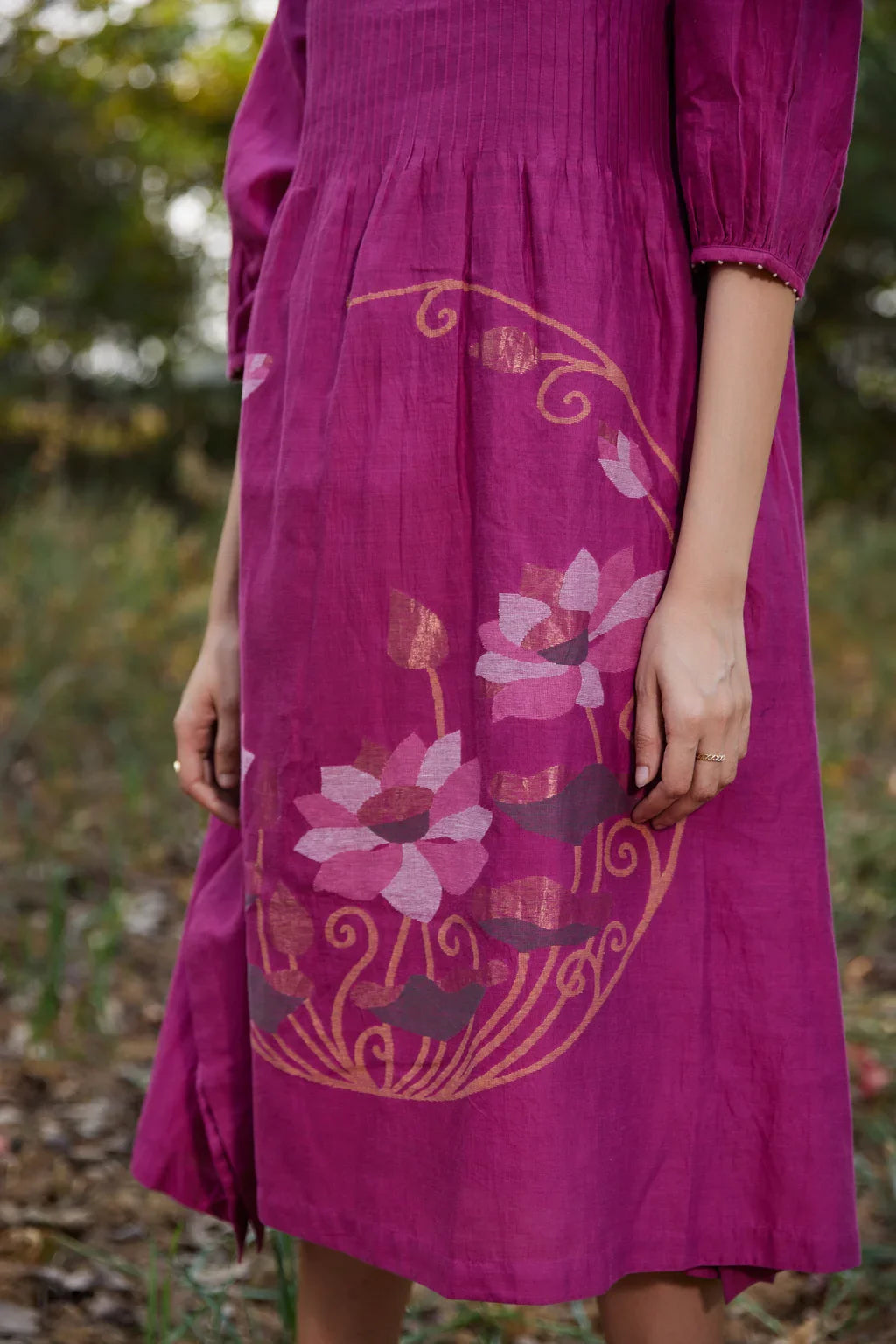 Sarron Keya Dress, fuchsia silk-cotton Jamdani dress with handwoven floral motifs on the skirt.