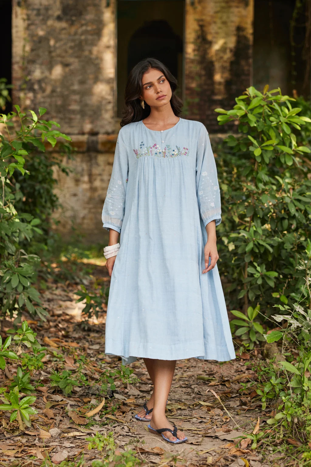 Sarron Kusum Dress, light blue cotton Jamdani dress with white and gold zari floral motifs.