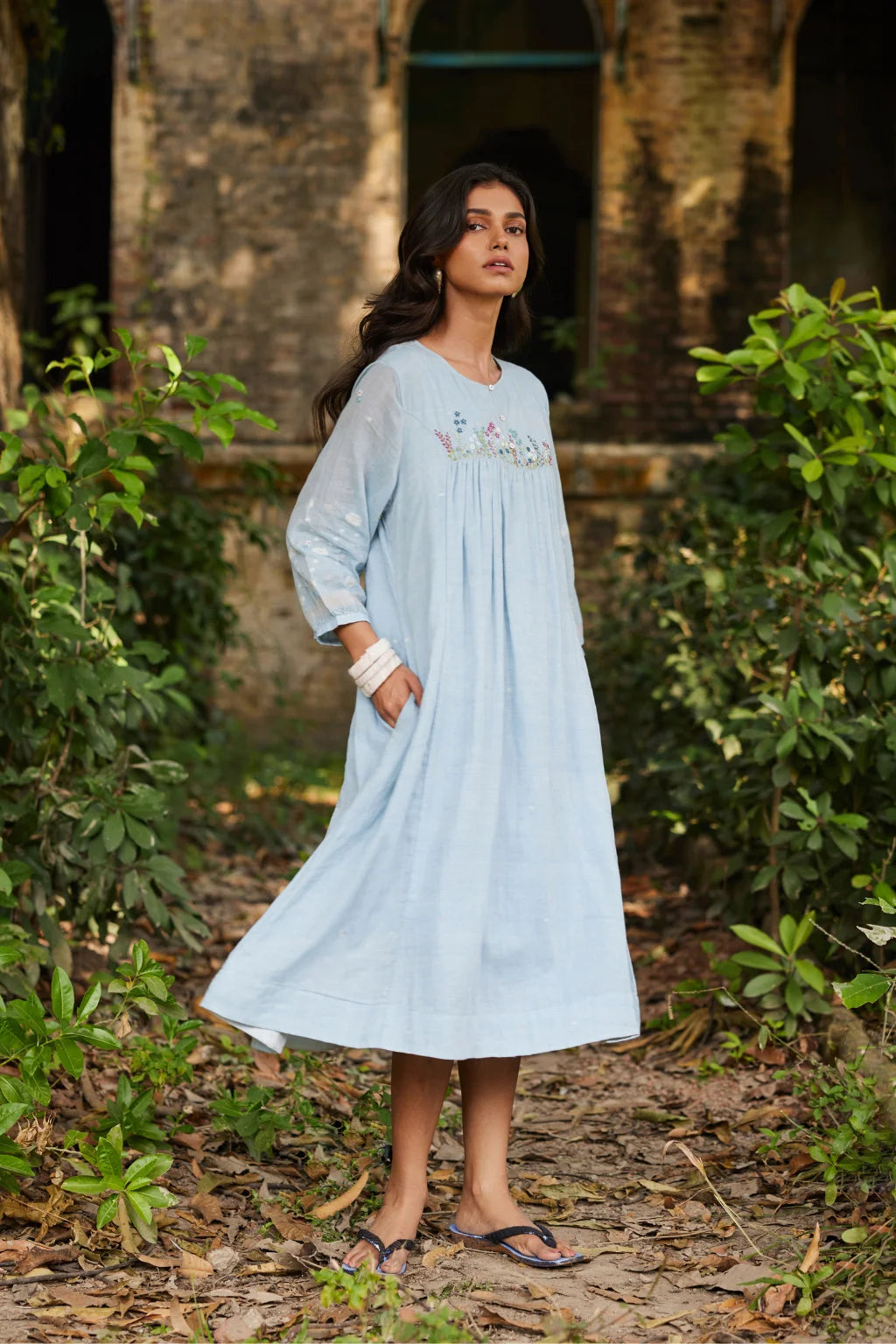 Sarron Kusum Dress, light blue cotton Jamdani dress with white and gold zari floral motifs.