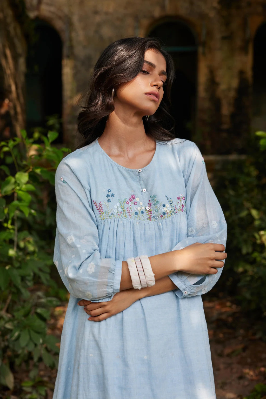 Sarron Kusum Dress, light blue cotton Jamdani dress with white and gold zari floral motifs.
