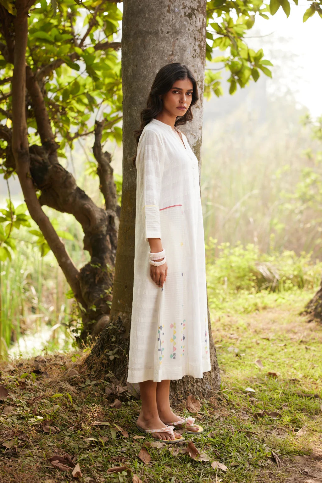 Sarron Lalitha Dress, white patchwork dress in cotton check and cotton Jamdani with geometric motifs.