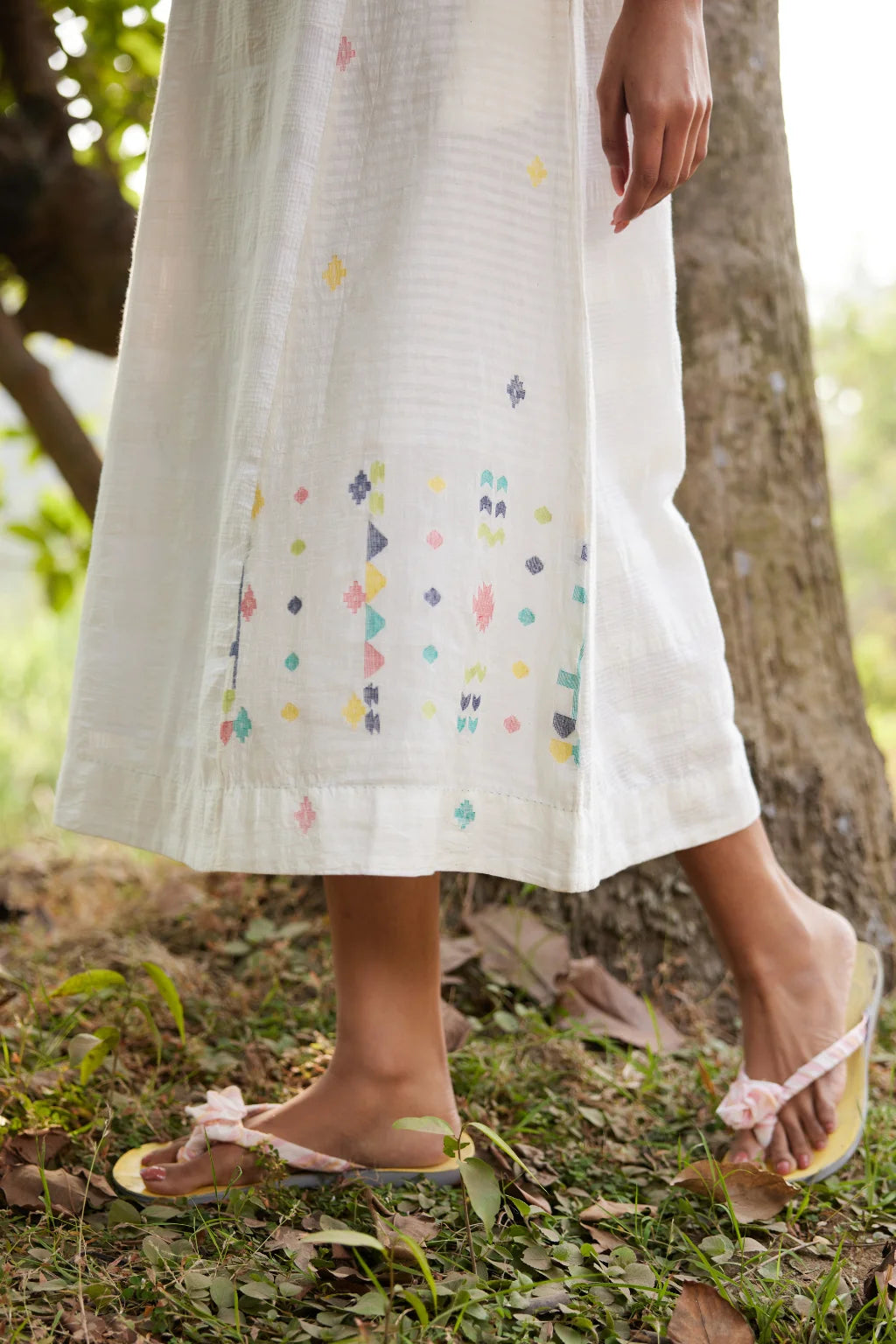 Sarron Lalitha Dress, white patchwork dress in cotton check and cotton Jamdani with geometric motifs.
