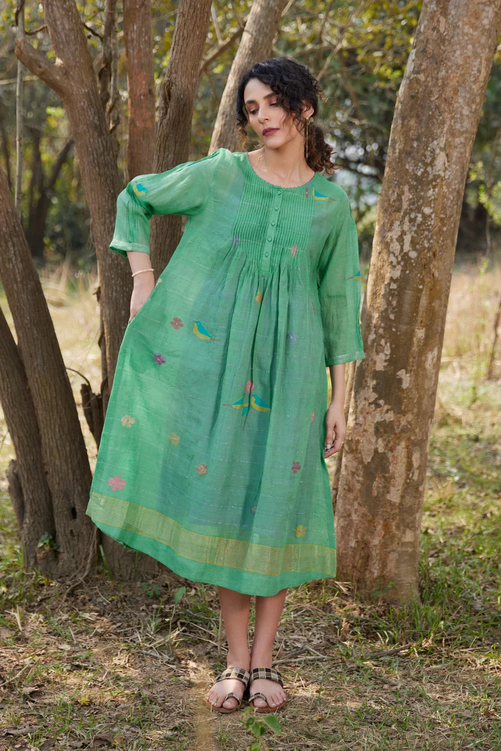 Sarron Mamata Dress, green silk-cotton Jamdani dress with sheer three-quarter sleeves and golden hem work.