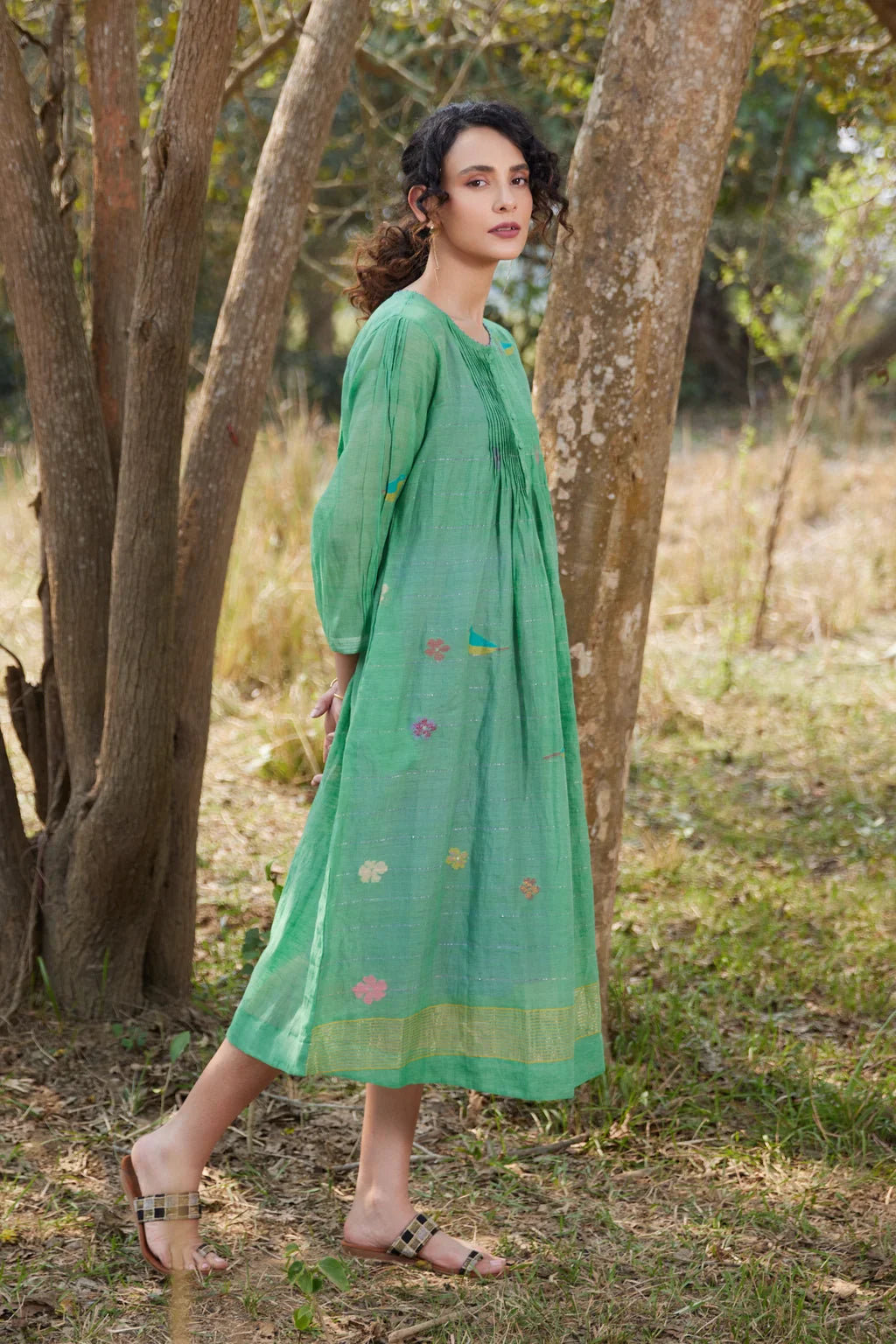 Sarron Mamata Dress, green silk-cotton Jamdani dress with sheer three-quarter sleeves and golden hem work.