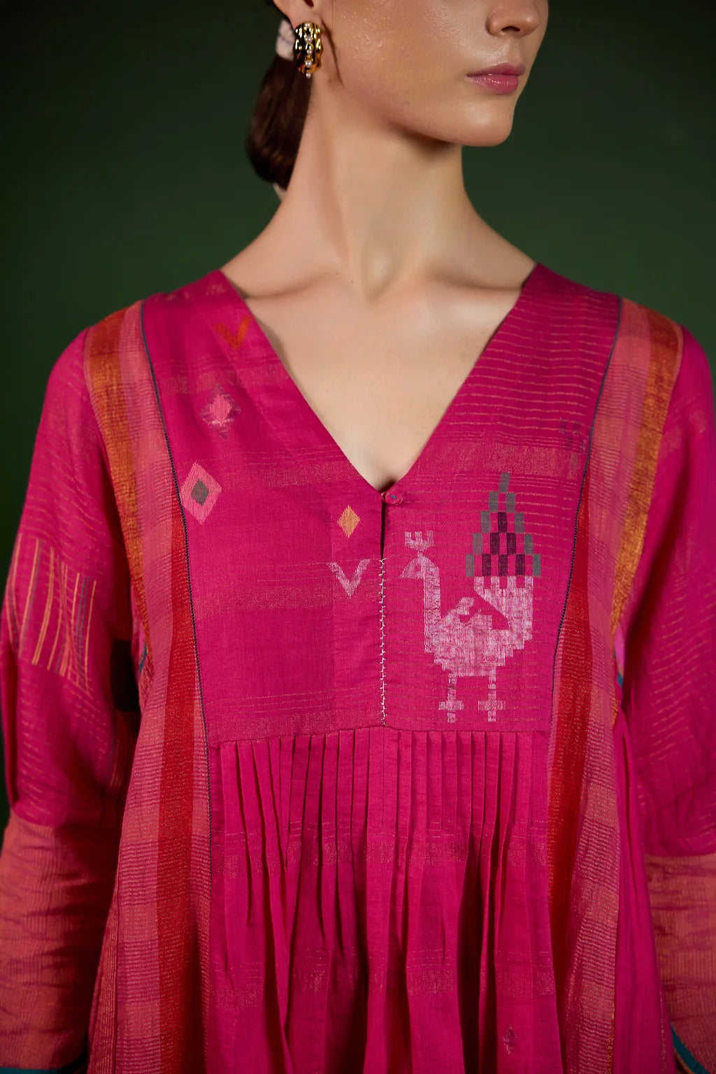 Sarron Mayura Dress, fuchsia pink silk-cotton Jamdani dress with handwoven peacock motifs and zari stripes.