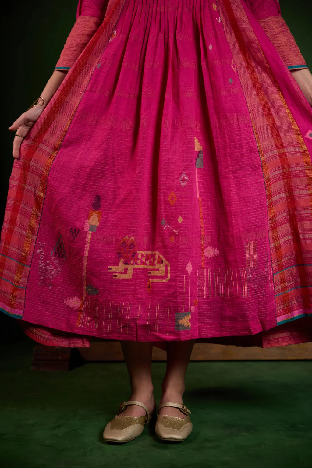 Sarron Mayura Dress, fuchsia pink silk-cotton Jamdani dress with handwoven peacock motifs and zari stripes.