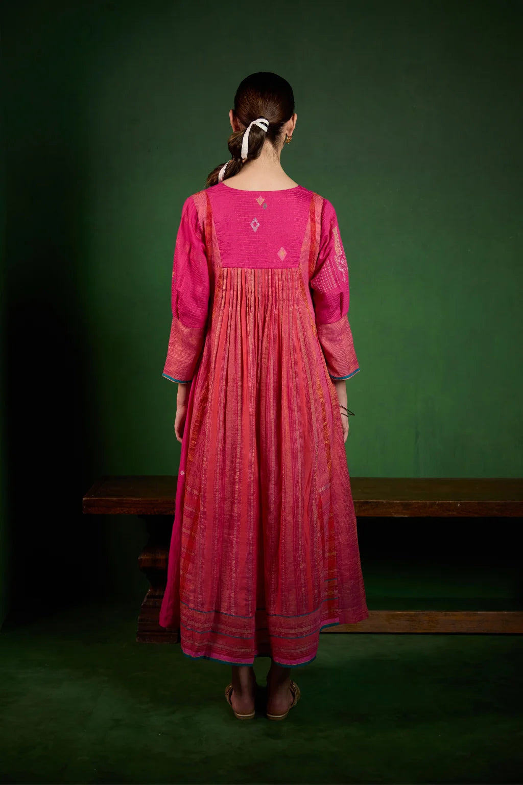 Sarron Mayura Dress, fuchsia pink silk-cotton Jamdani dress with handwoven peacock motifs and zari stripes.