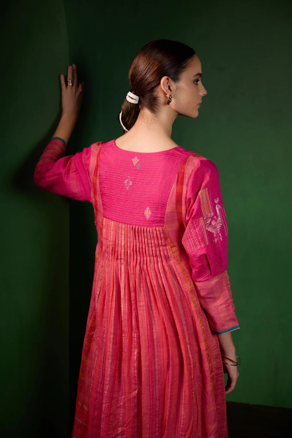 Sarron Mayura Dress, fuchsia pink silk-cotton Jamdani dress with handwoven peacock motifs and zari stripes.