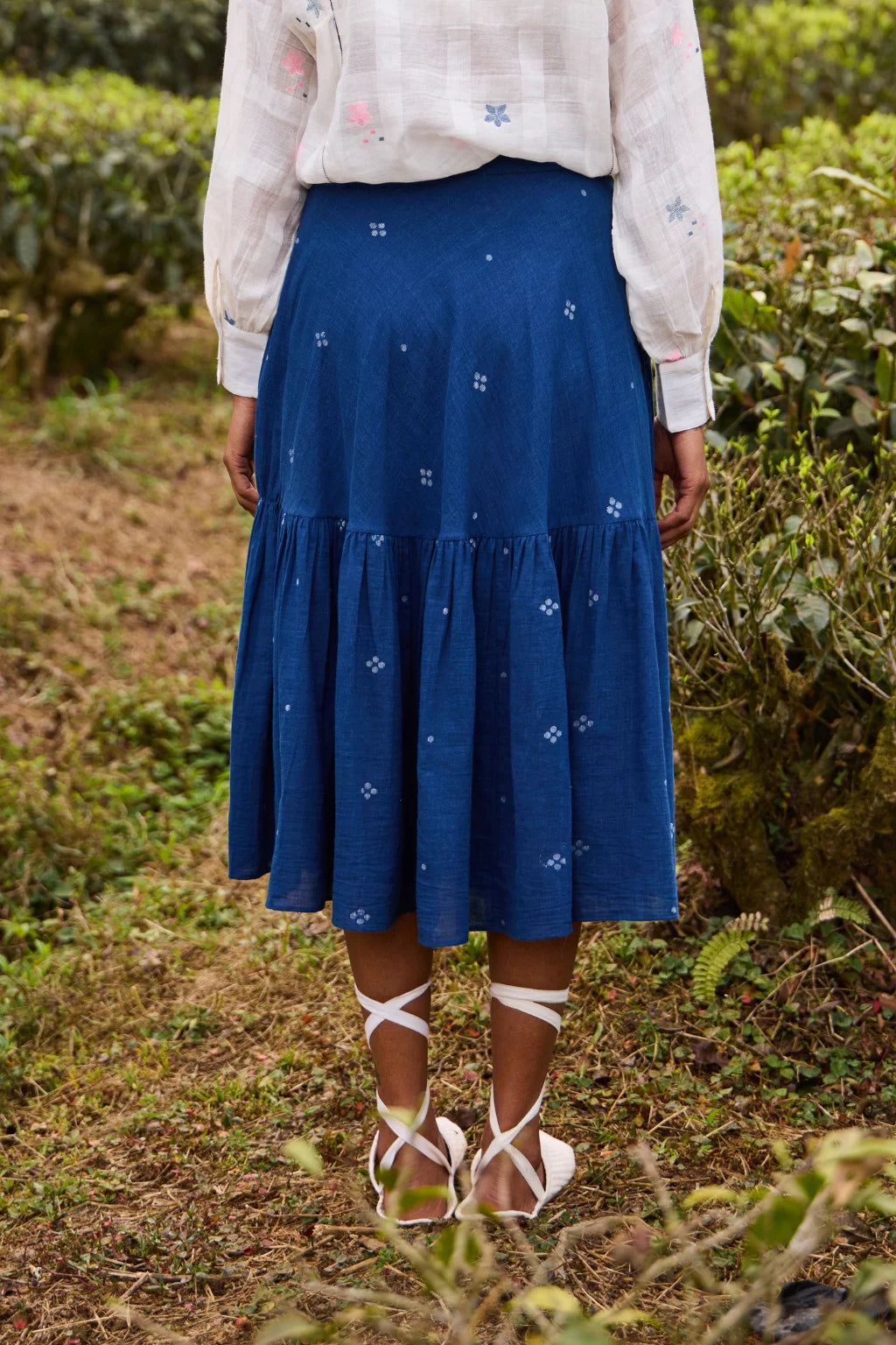 Sarron Neeltara Skirt, dark indigo cotton Jamdani skirt with four-ball Jamdani motifs and side pockets.