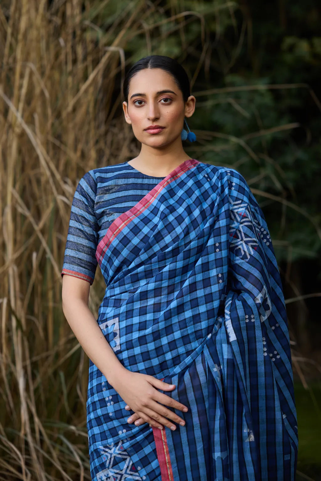 Sarron Nila-001 Saree, indigo checked cotton Jamdani saree with abstract geometric motifs and red selvedge.