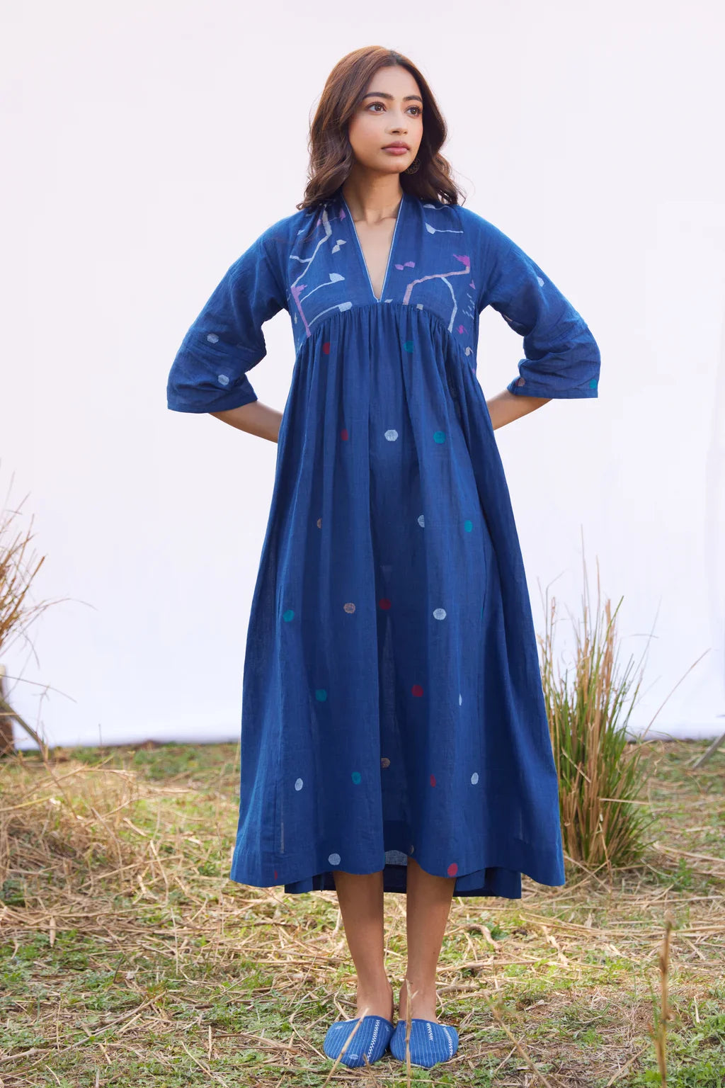 Sarron Nilu Dress, dark indigo cotton Jamdani dress with scattered geometric motifs and side slits.
