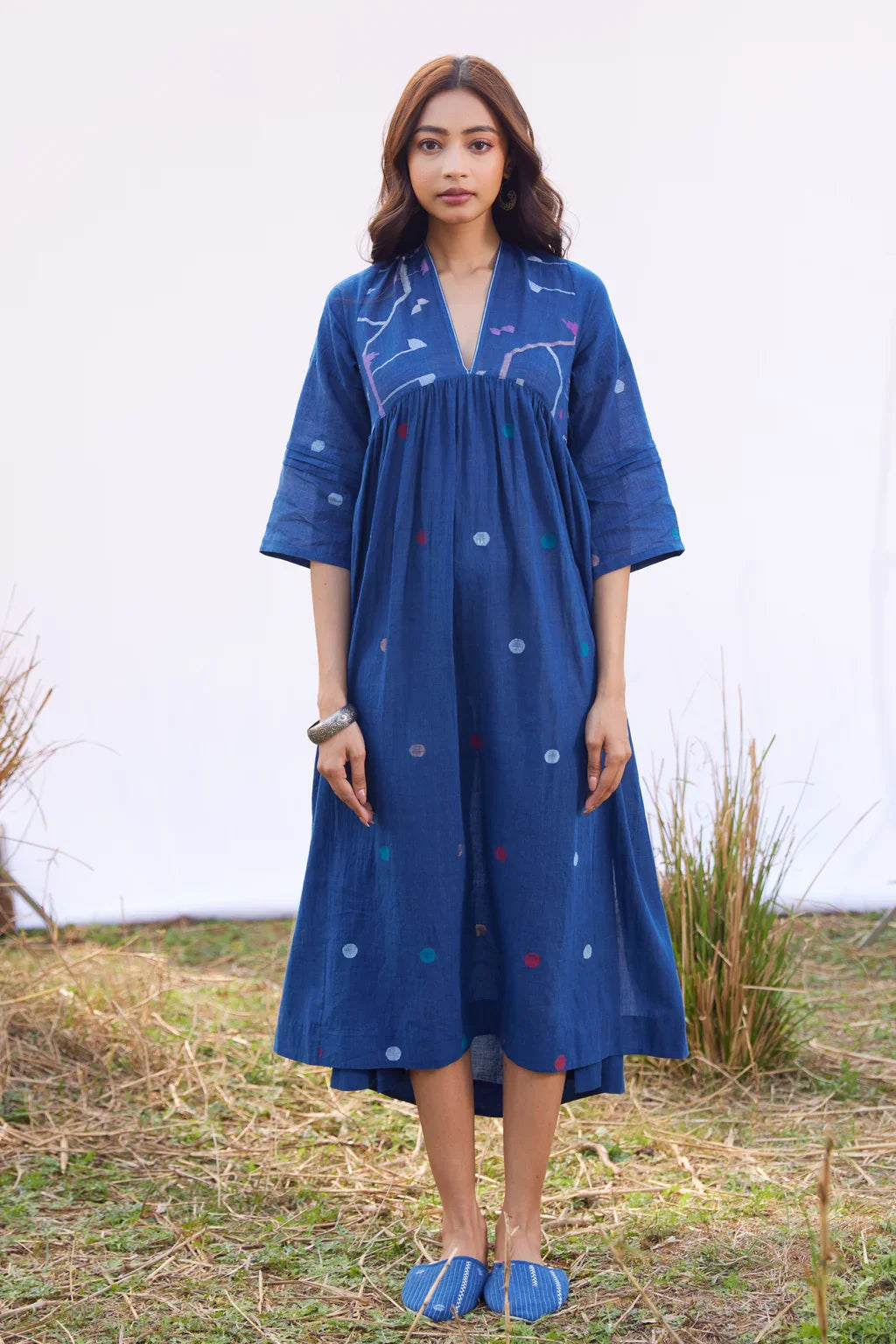 Sarron Nilu Dress, dark indigo cotton Jamdani dress with scattered geometric motifs and side slits.