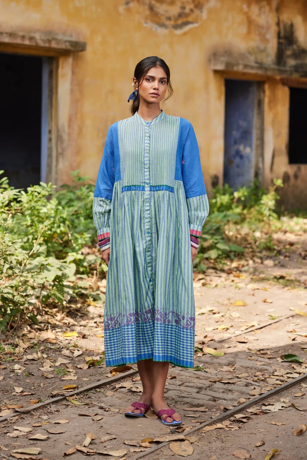 Sarron Nishita Dress, blue and green patchwork cotton Jamdani dress with geometric and floral motifs.
