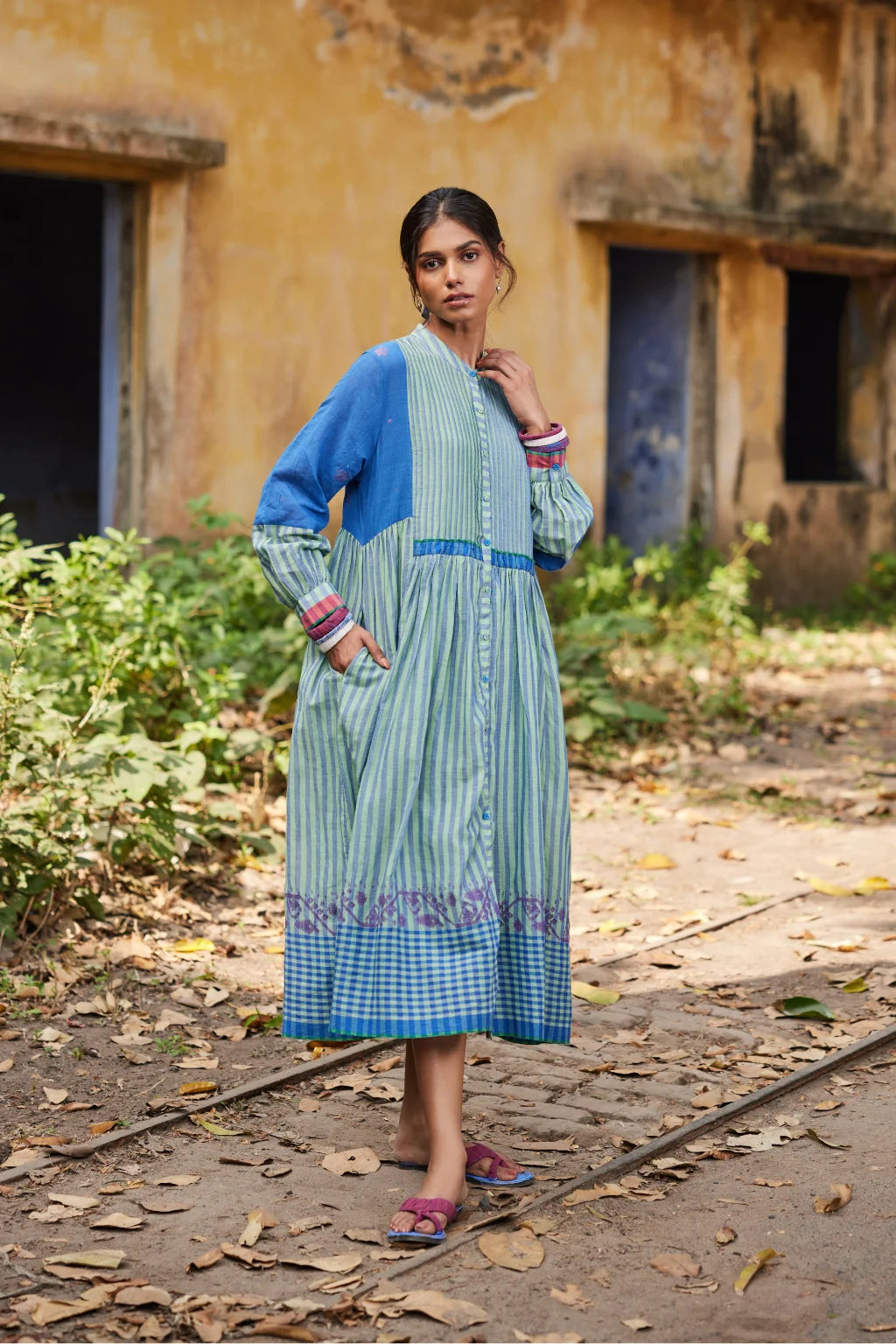 Sarron Nishita Dress, blue and green patchwork cotton Jamdani dress with geometric and floral motifs.