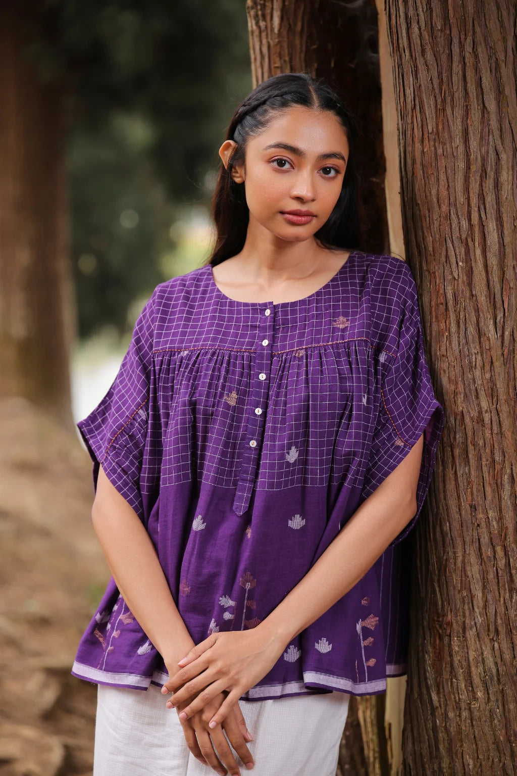 Sarron Pakhila Top, plum purple front-open cotton Jamdani top with handwoven checks and floral motifs.