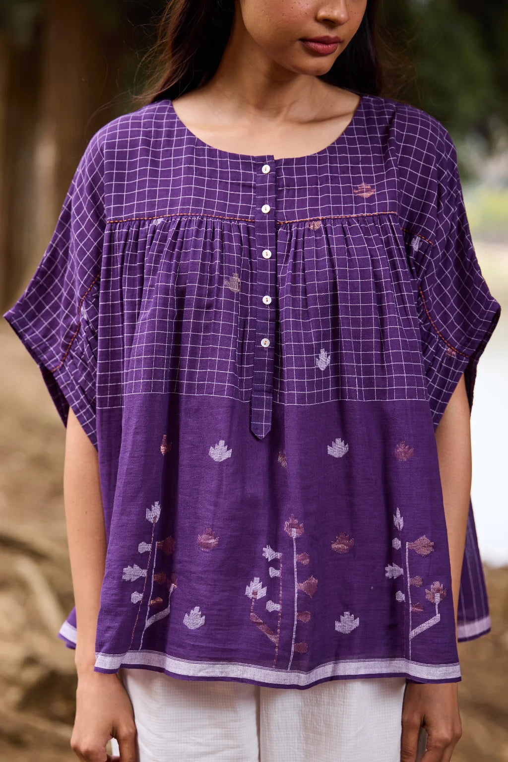 Sarron Pakhila Top, plum purple front-open cotton Jamdani top with handwoven checks and floral motifs.