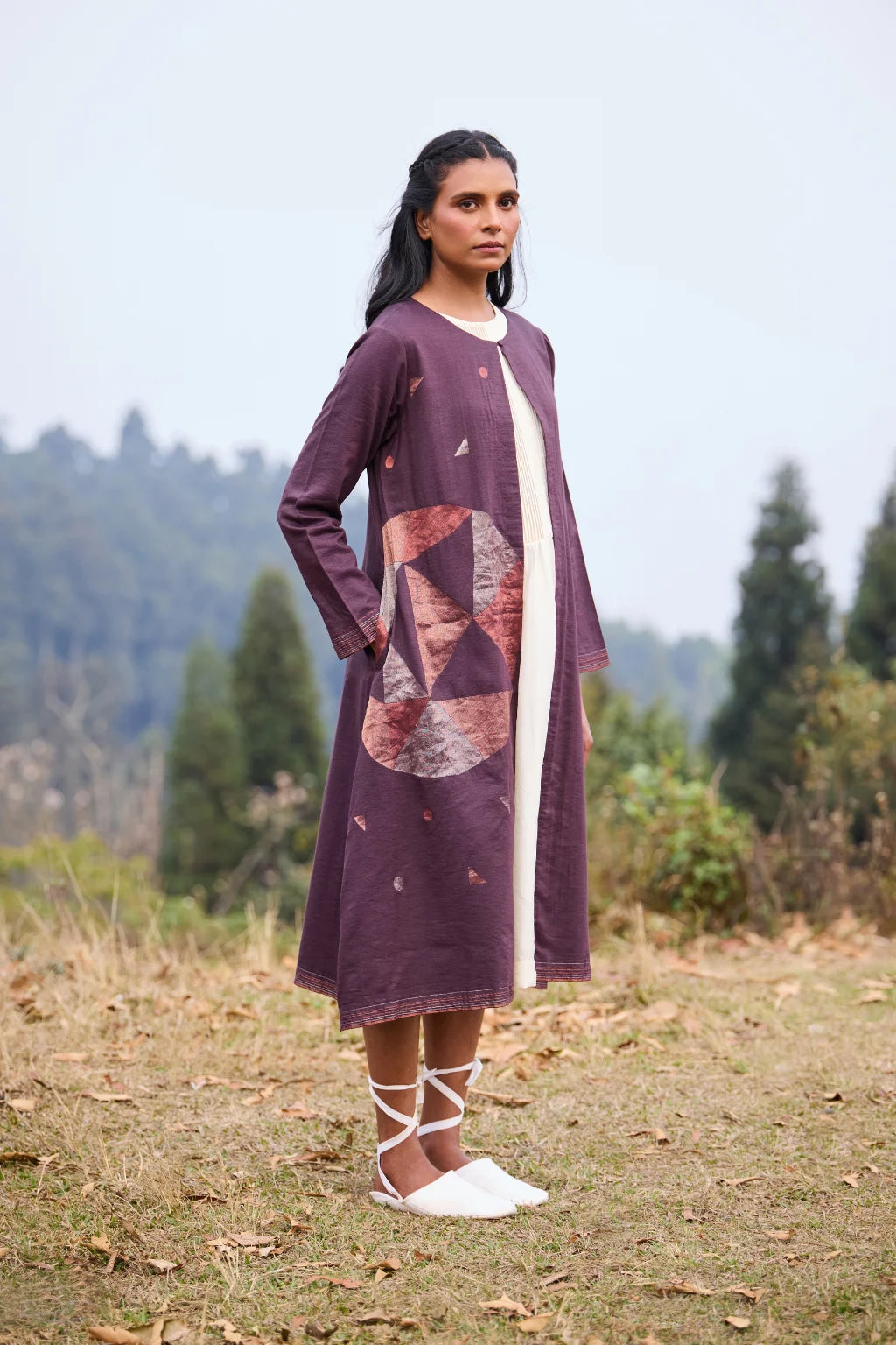 Sarron Parijat Set, ivory silk dress with hand-painted motifs and a plum silk-cotton Jamdani overlay.