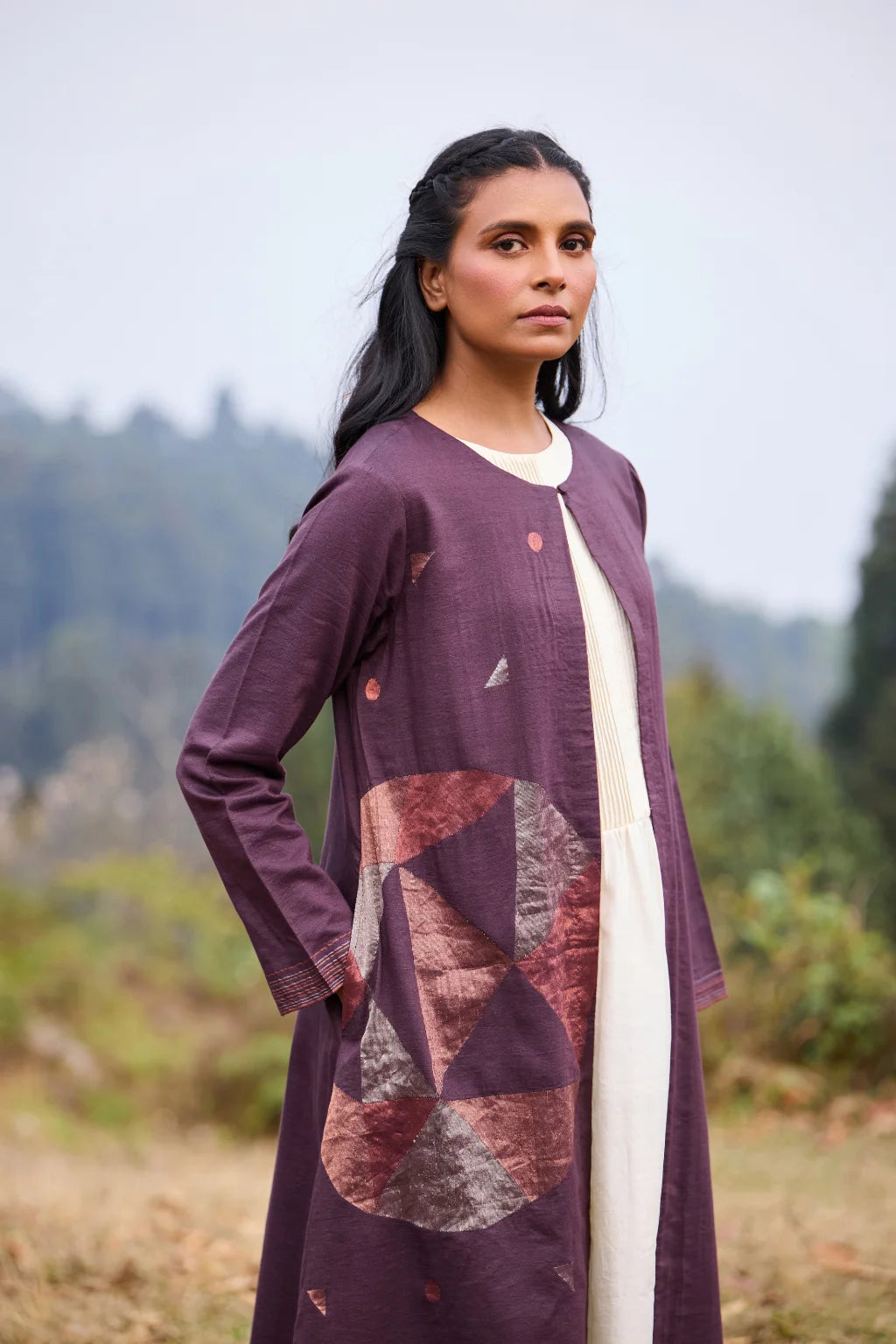Sarron Parijat Set, ivory silk dress with hand-painted motifs and a plum silk-cotton Jamdani overlay.