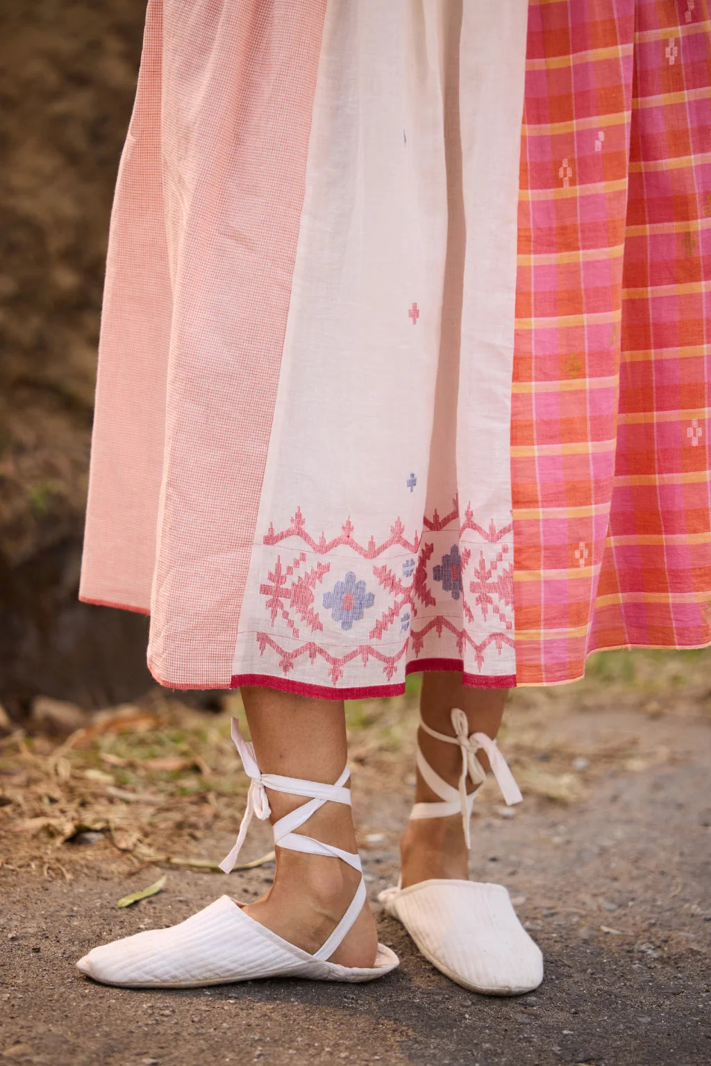 Sarron Phulkoli Skirt, panelled cotton Jamdani skirt in white, pink and red with woven Jamdani borders.