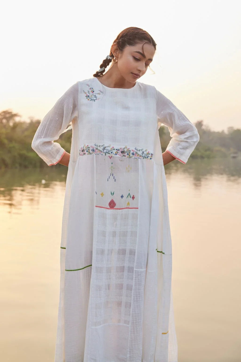 Sarron Rhea Dress, white cotton Jamdani dress with handwoven floral motifs and waist smocking.