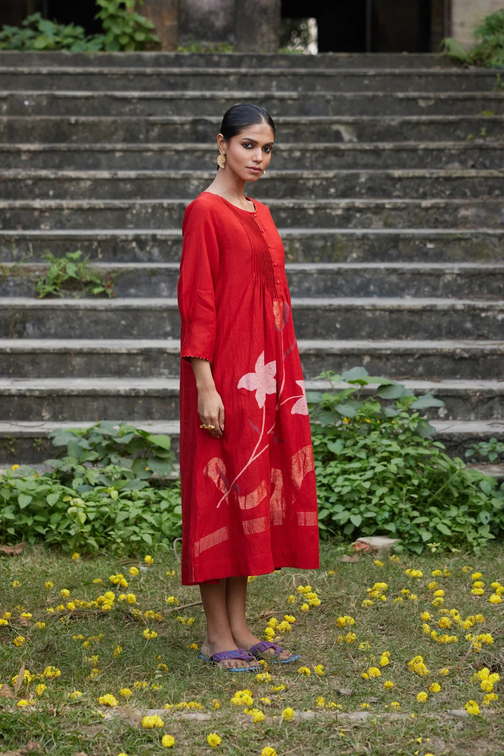 Sarron Ruhani Dress, red silk-cotton placement Jamdani dress with large floral butas and zari Kantha embroidery.