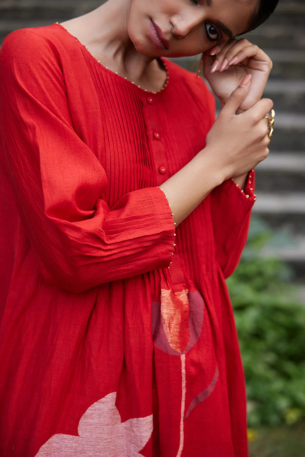 Sarron Ruhani Dress, red silk-cotton placement Jamdani dress with large floral butas and zari Kantha embroidery.