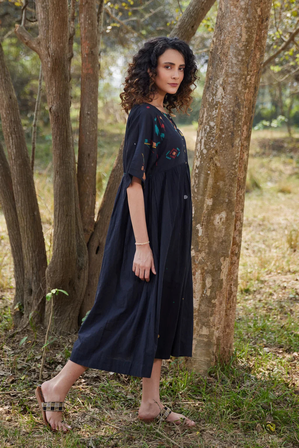 Sarron Shila Dress, solid black cotton Jamdani dress, calf length with a round neck and half sleeves.