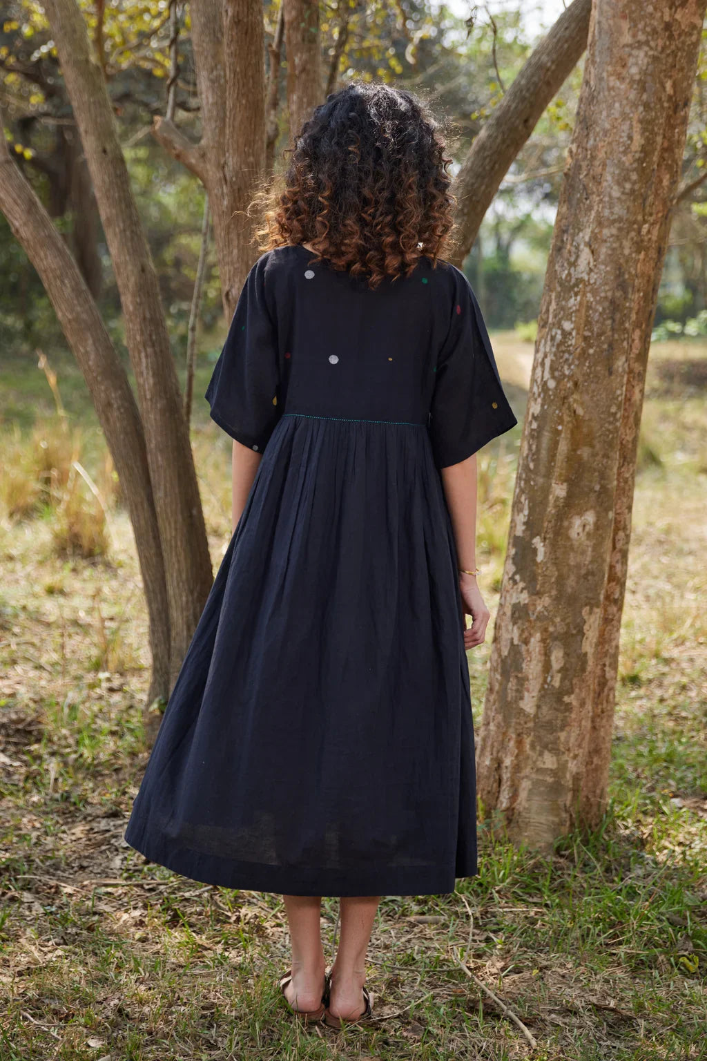 Sarron Shila Dress, solid black cotton Jamdani dress, calf length with a round neck and half sleeves.