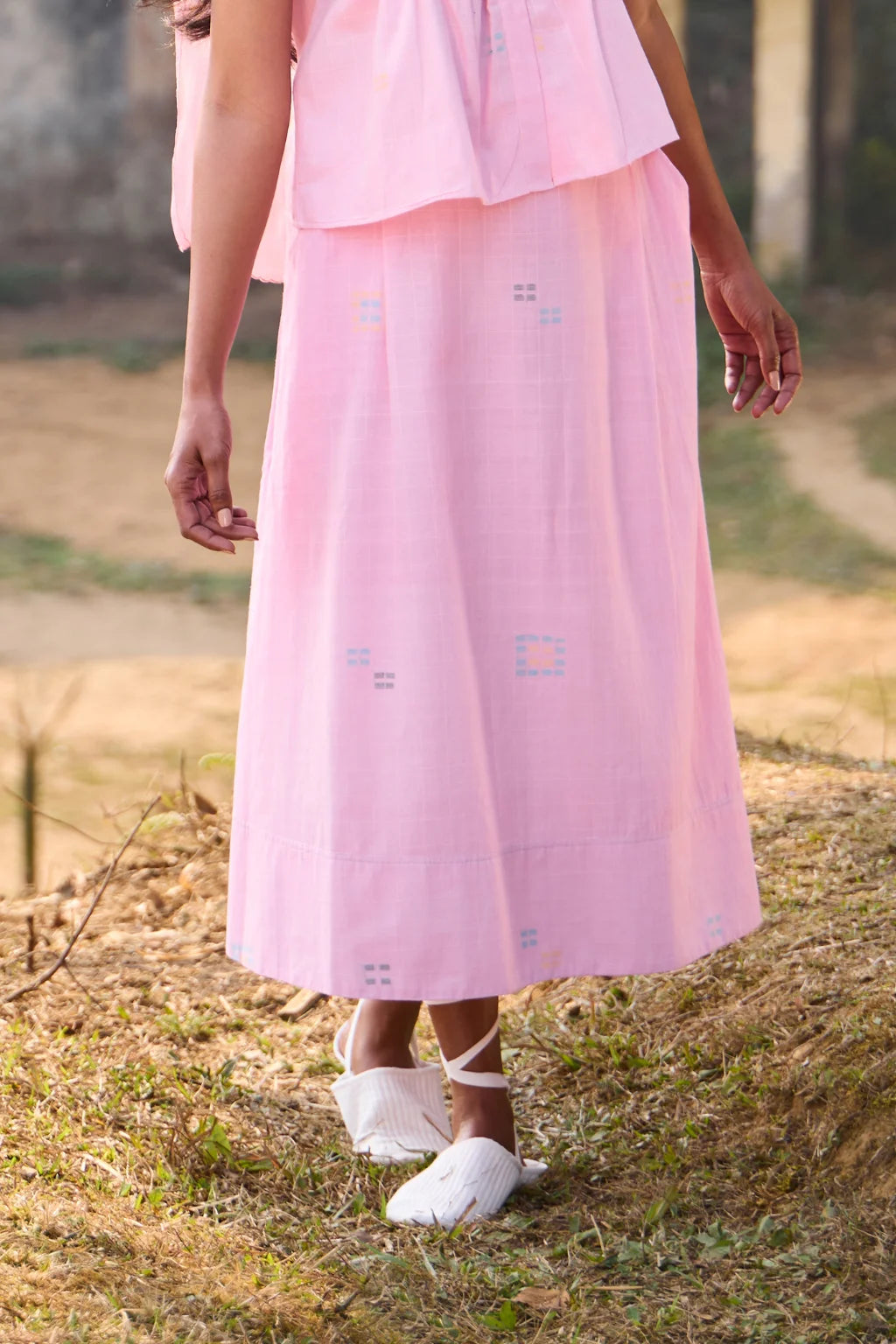 Sarron Shonpakhi Skirt, soft pink checked cotton Jamdani A-line skirt with geometric motifs.