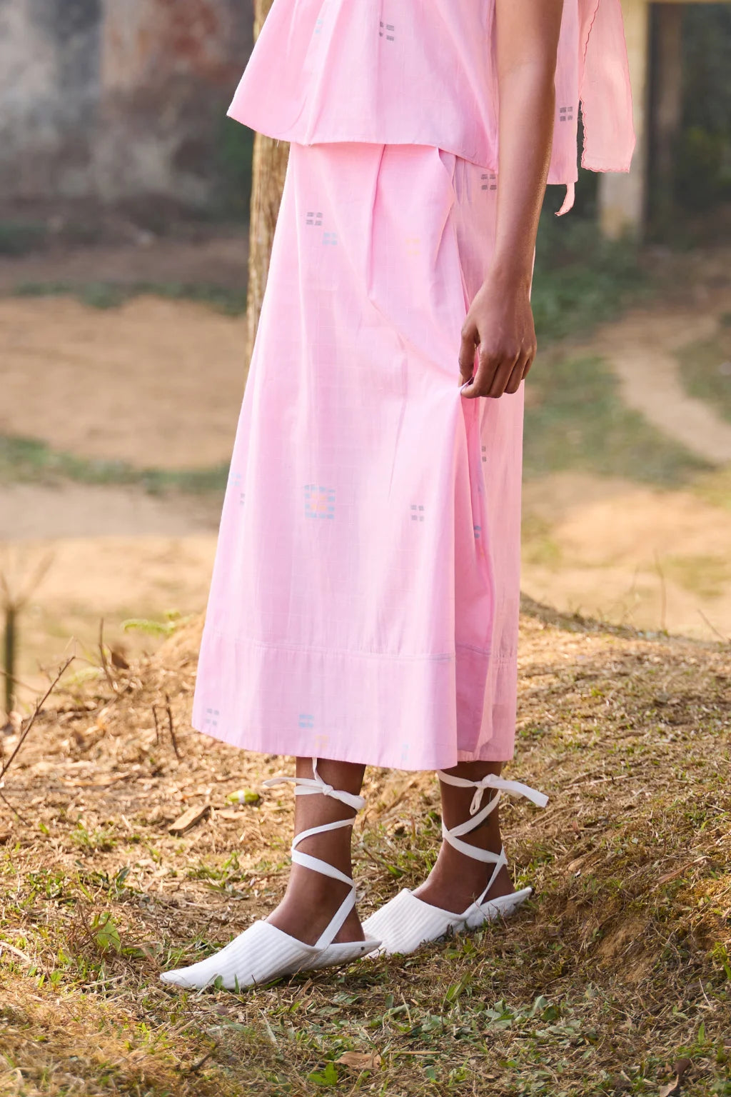 Sarron Shonpakhi Skirt, soft pink checked cotton Jamdani A-line skirt with geometric motifs.