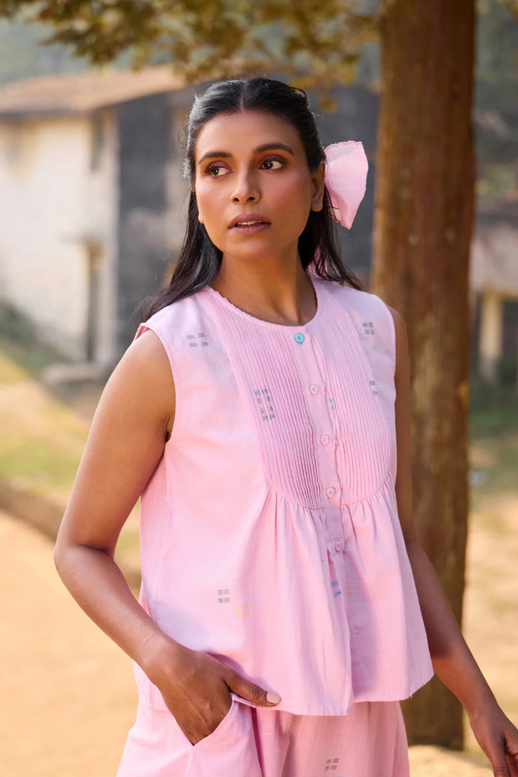 Sarron Shonpakhi Top, sleeveless pink checked cotton Jamdani top with geometric motifs and pintucks.