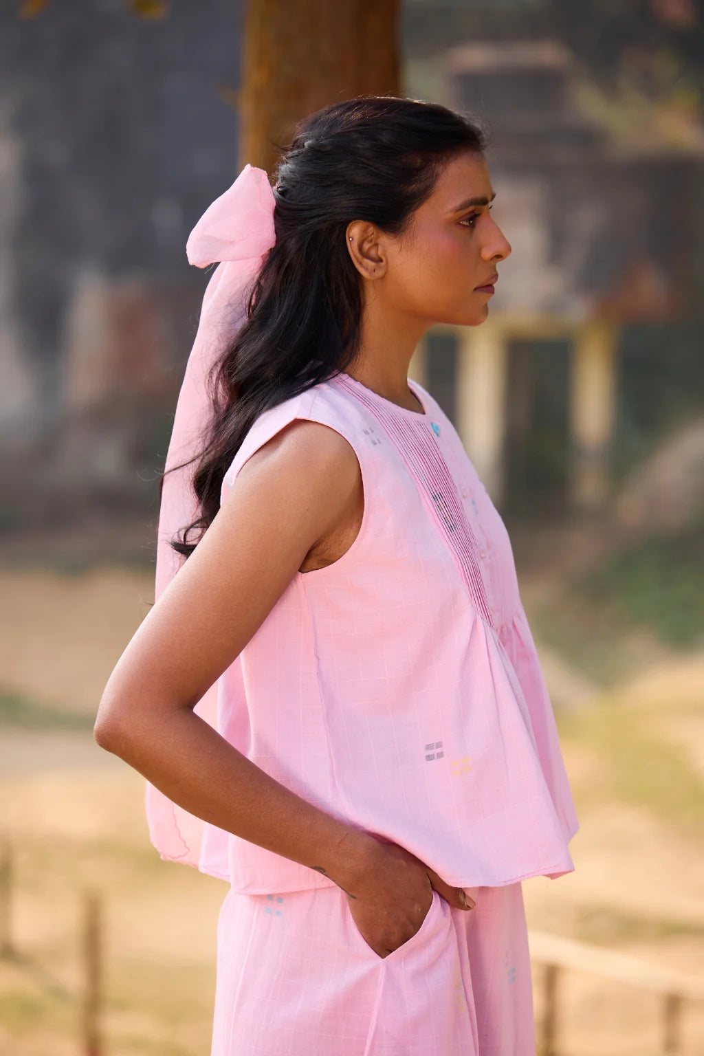 Sarron Shonpakhi Top, sleeveless pink checked cotton Jamdani top with geometric motifs and pintucks.