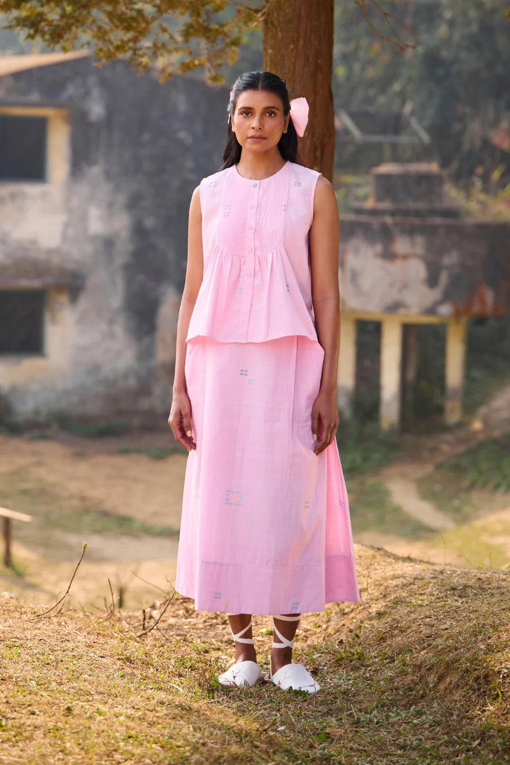 Sarron Shonpakhi Top, sleeveless pink checked cotton Jamdani top with geometric motifs and pintucks.