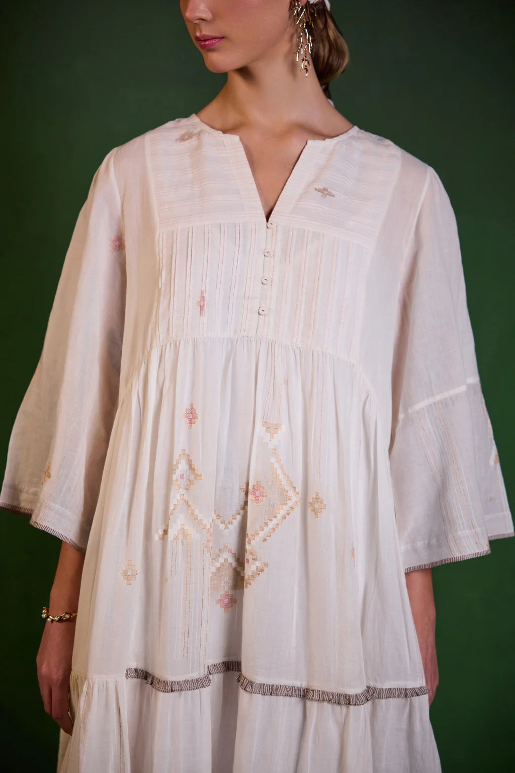 Sarron Shubhra Dress, ivory white silk-cotton Jamdani dress with ghicha zari motifs and a tiered cut.